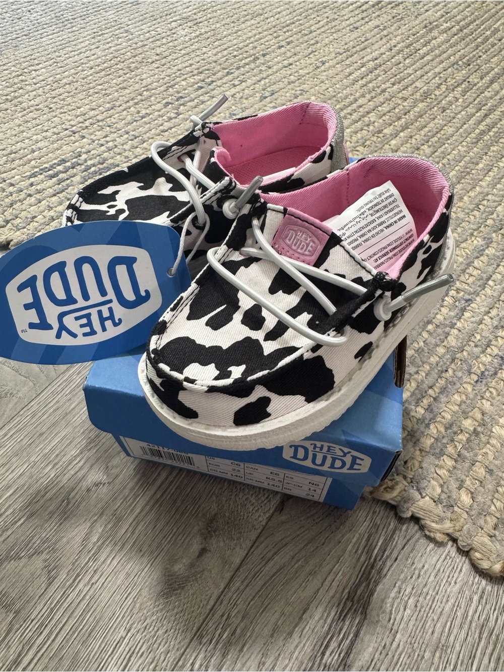 Hey Dude Kids Cow-Print Sneakers — Black & White with Pink Interior